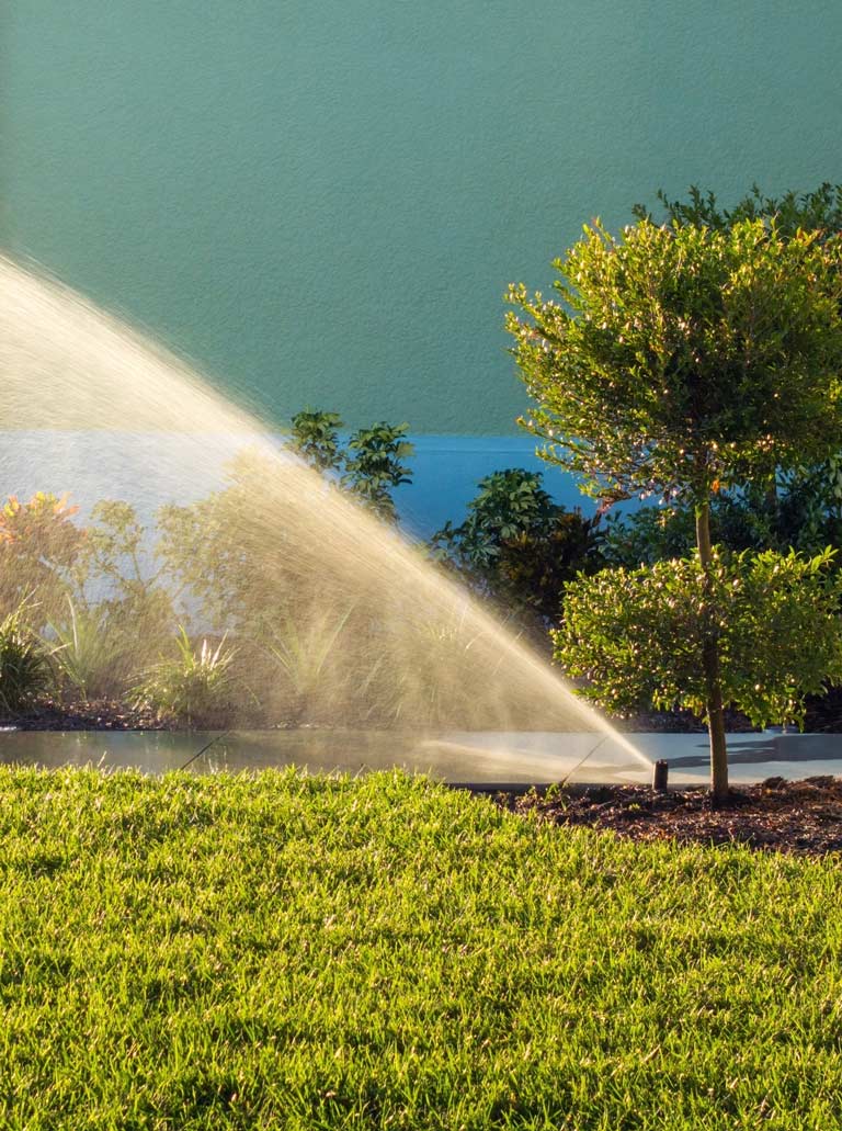 Irrigation system watering lawn mobile